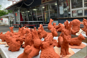 clay animals on a table